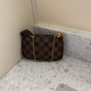 Authentic Louis Vuitton Mini Pochette